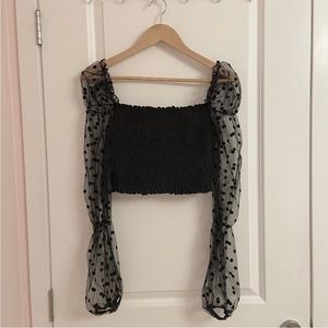 black cinched polka dot mesh crop top